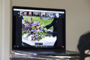 Image of a video funeral on a monitor